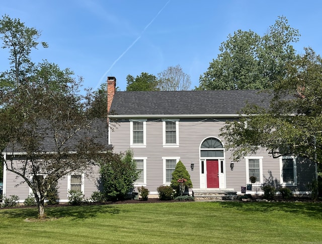 47 Merwin Brook Rd, Brookfield, CT 06804 - colonial-style house with a front yard and a chimney