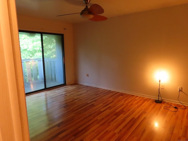 1 Birch Ln Unit D, East Haven, CT 06513 - empty room with wood finished floors and a ceiling fan