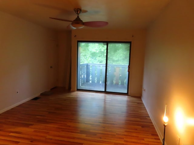 1 Birch Ln Unit D, East Haven, CT 06513 - empty room with a ceiling fan and wood finished floors