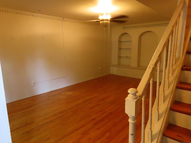 1 Birch Ln Unit D, East Haven, CT 06513 - unfurnished room featuring wood finished floors and stairs