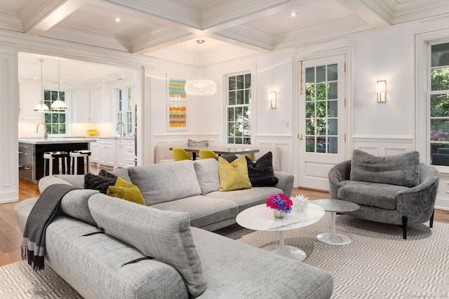 354 S Ave, New Canaan, CT 06840 - living area featuring light wood-type flooring, coffered ceiling, and beam ceiling