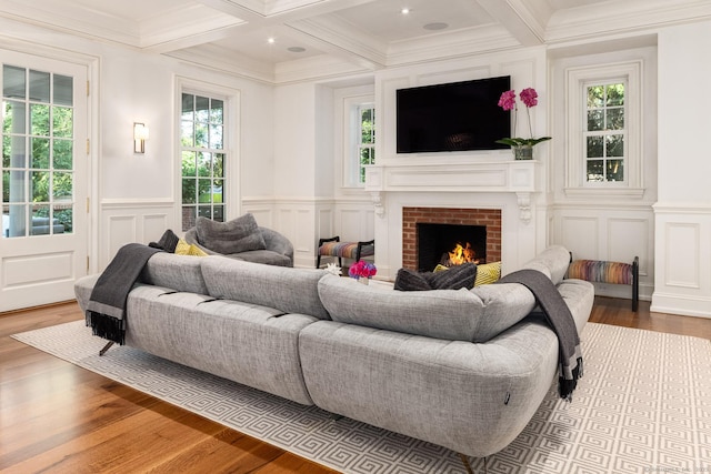 354 S Ave, New Canaan, CT 06840 - living room featuring a decorative wall, beam ceiling, coffered ceiling, a fireplace, and wood finished floors
