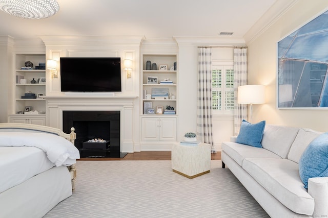 354 S Ave, New Canaan, CT 06840 - living area with ornamental molding, wood finished floors, built in shelves, and a fireplace