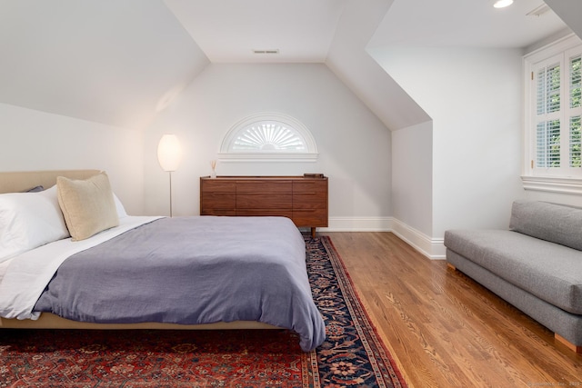 354 S Ave, New Canaan, CT 06840 - bedroom featuring wood finished floors and vaulted ceiling