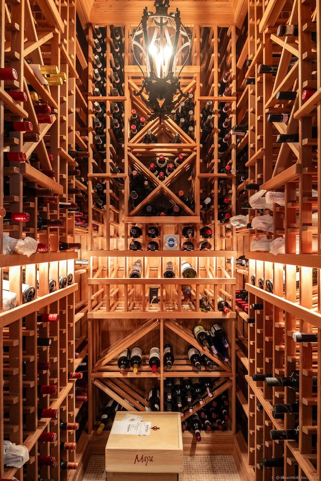 354 S Ave, New Canaan, CT 06840 - wine room featuring a chandelier