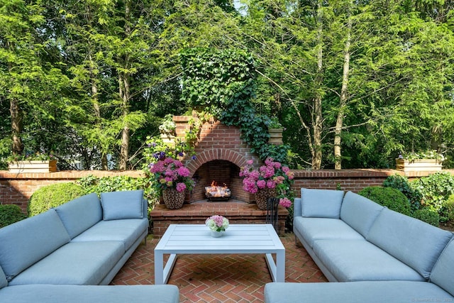 354 S Ave, New Canaan, CT 06840 - view of patio / terrace with an outdoor living space with a fireplace