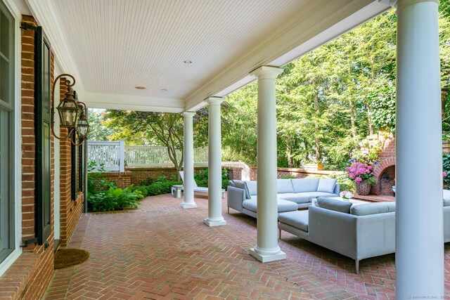 354 S Ave, New Canaan, CT 06840 - covered porch featuring an outdoor living space