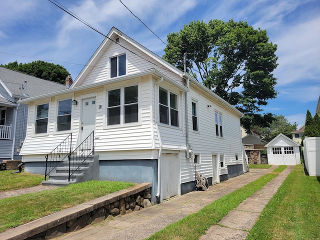 87 Fairview Ave, West Haven, CT 06516 - view of front facade with entry steps and an outbuilding