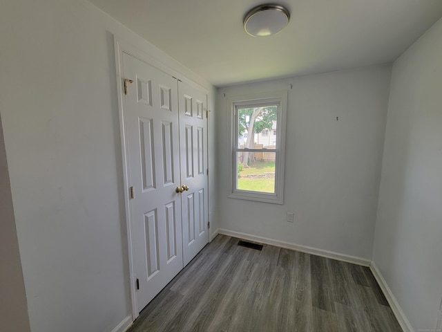 87 Fairview Ave, West Haven, CT 06516 - unfurnished bedroom featuring wood finished floors and a closet