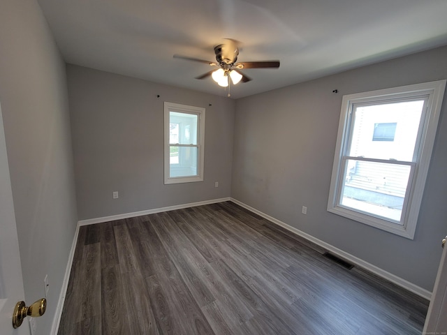 87 Fairview Ave, West Haven, CT 06516 - unfurnished room featuring dark wood-type flooring and a ceiling fan