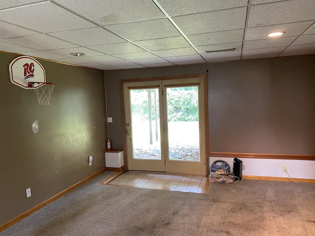 127 Nicole Dr, Milford, CT 06460 - doorway to outside featuring light colored carpet and a paneled ceiling