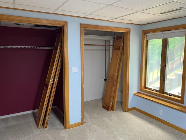 127 Nicole Dr, Milford, CT 06460 - unfurnished bedroom with baseboards and light colored carpet