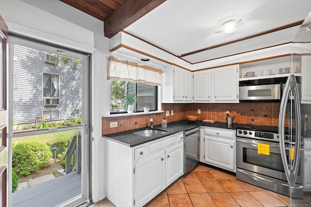 421 Glenbrook Rd Apt 2, Stamford, CT 06906 - kitchen featuring stainless steel appliances, dark countertops, white cabinetry, tasteful backsplash, and open shelves