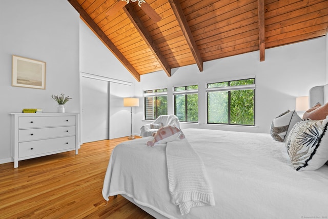 421 Glenbrook Rd Apt 2, Stamford, CT 06906 - bedroom featuring a wooden ceiling with exposed beams, multiple windows, wood finished floors, and high vaulted ceiling