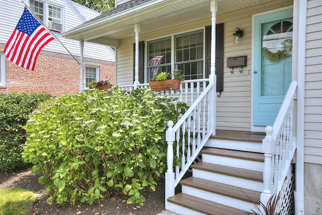 1221 Merritt St, Fairfield, CT 06825 - view of exterior entry featuring a porch