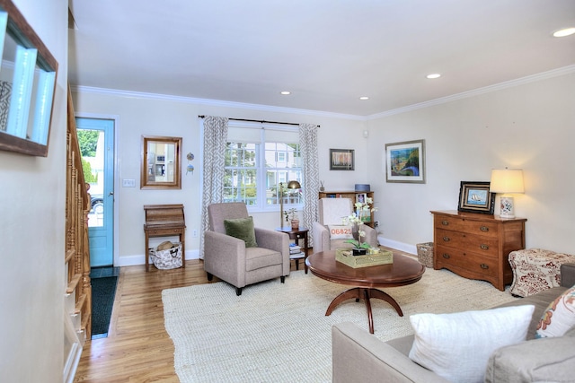1221 Merritt St, Fairfield, CT 06825 - living area with plenty of natural light, ornamental molding, light wood-style flooring, and recessed lighting
