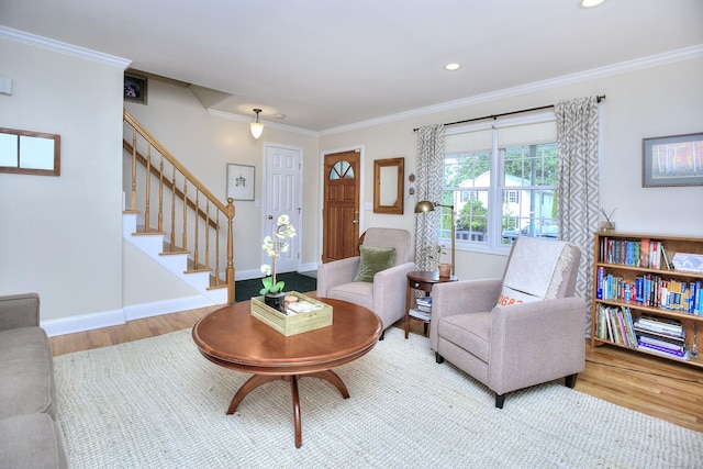 1221 Merritt St, Fairfield, CT 06825 - living room featuring wood finished floors, crown molding, stairway, and recessed lighting