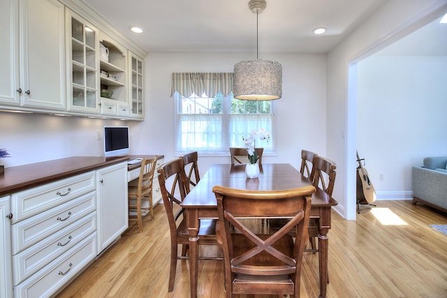 1221 Merritt St, Fairfield, CT 06825 - dining room with built in desk, light wood-style flooring, and recessed lighting