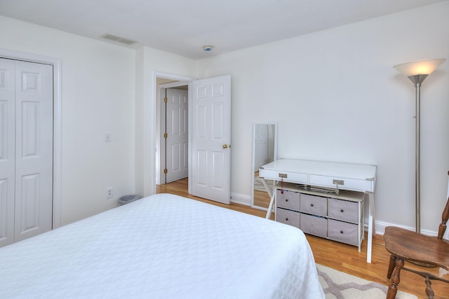 1221 Merritt St, Fairfield, CT 06825 - bedroom featuring light wood-style floors and a closet