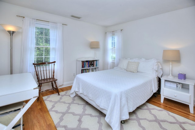 1221 Merritt St, Fairfield, CT 06825 - bedroom with wood finished floors