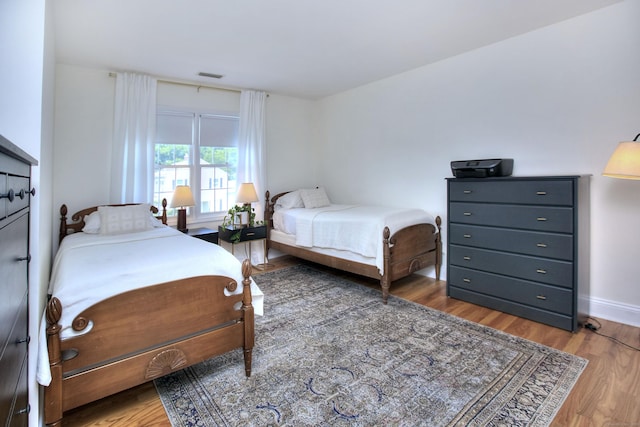 1221 Merritt St, Fairfield, CT 06825 - bedroom featuring wood finished floors and baseboards