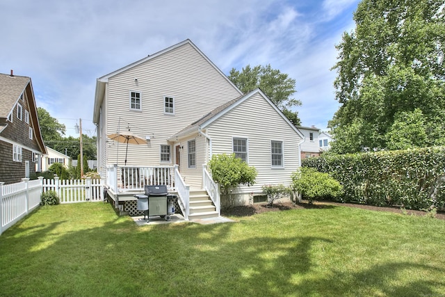 1221 Merritt St, Fairfield, CT 06825 - rear view of house with a wooden deck and a fenced backyard
