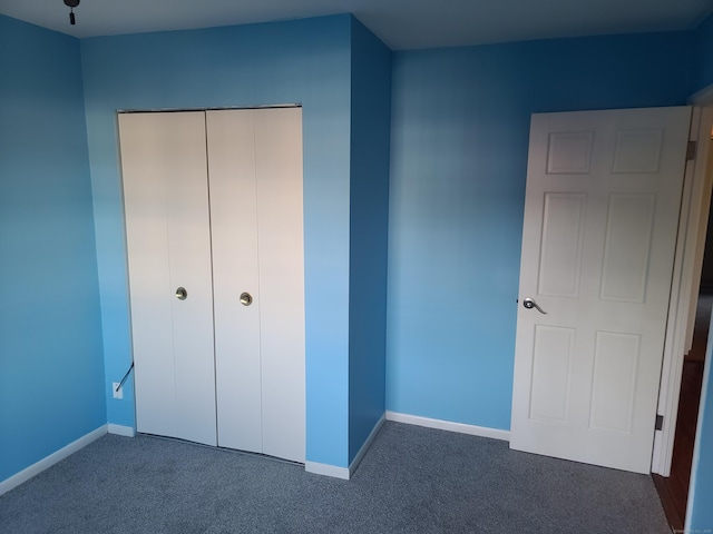 51 Savin Park Unit 51, West Haven, CT 06516 - unfurnished bedroom with carpet flooring and a closet