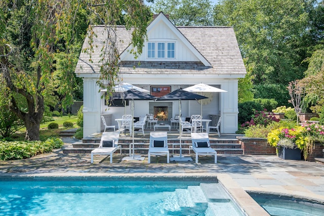 14 Market St, Ridgefield, CT 06877 - outdoor pool featuring an exterior structure, a patio area, and an outdoor structure