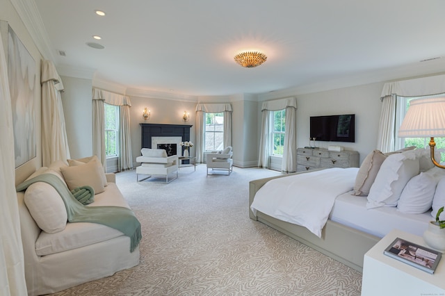 14 Market St, Ridgefield, CT 06877 - bedroom with multiple windows, carpet flooring, a fireplace, crown molding, and recessed lighting