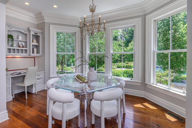 14 Market St, Ridgefield, CT 06877 - dining space with dark wood-style flooring, ornamental molding, built in study area, and a chandelier