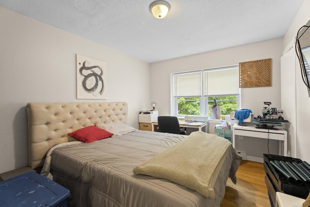 212 Sheffield Ave, New Haven, CT 06511 - bedroom with wood finished floors and a textured ceiling