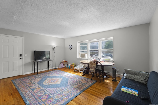 212 Sheffield Ave, New Haven, CT 06511 - living area featuring wood finished floors and a textured ceiling