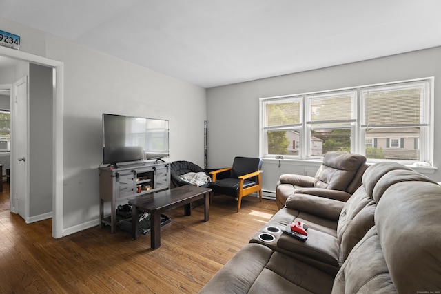 212 Sheffield Ave, New Haven, CT 06511 - living area featuring wood finished floors and baseboard heating