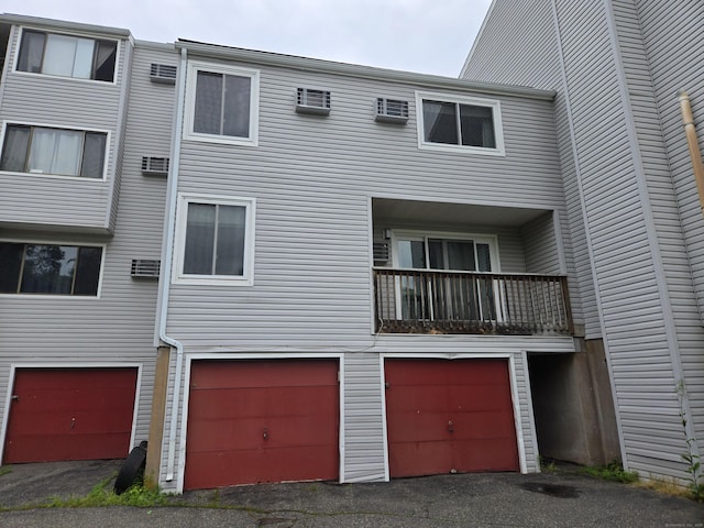 655 Talcottville Rd Apt 89, Vernon, CT 06066 - back of house with a garage and driveway