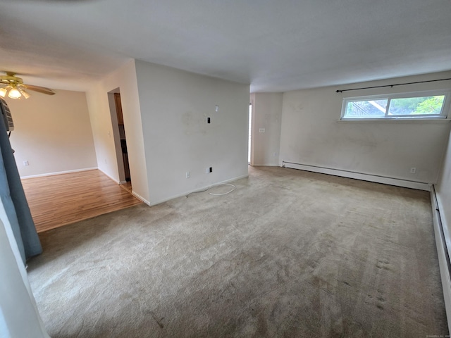 655 Talcottville Rd Apt 89, Vernon, CT 06066 - spare room with a baseboard heating unit, carpet flooring, and a ceiling fan