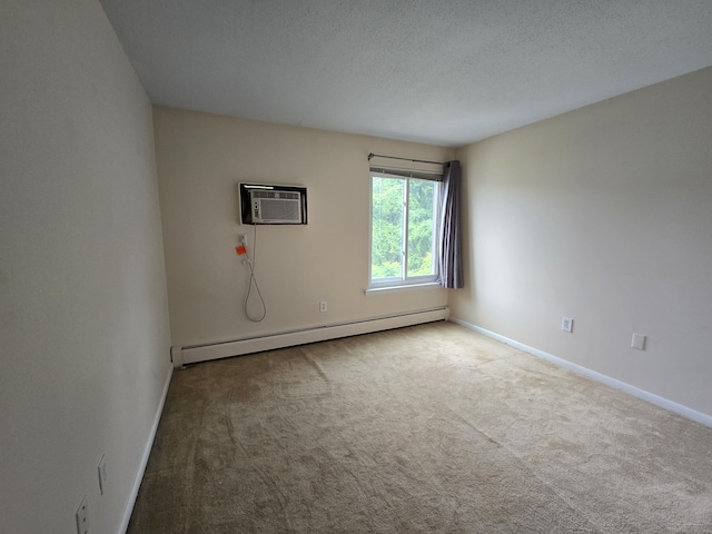 655 Talcottville Rd Apt 89, Vernon, CT 06066 - empty room featuring a baseboard radiator, a wall unit AC, carpet, and a textured ceiling