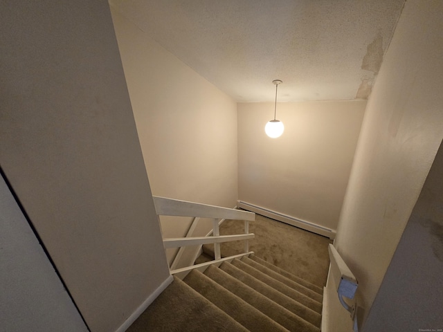 655 Talcottville Rd Apt 89, Vernon, CT 06066 - staircase featuring baseboard heating, carpet, and a textured ceiling