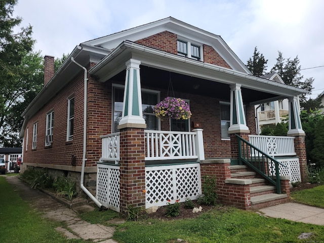 50 Tracy Ave, Waterbury, CT 06706 - view of front of home with covered porch and brick siding