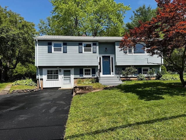 26 Nejako Dr, Middletown, CT 06457 - raised ranch with a front lawn and entry steps