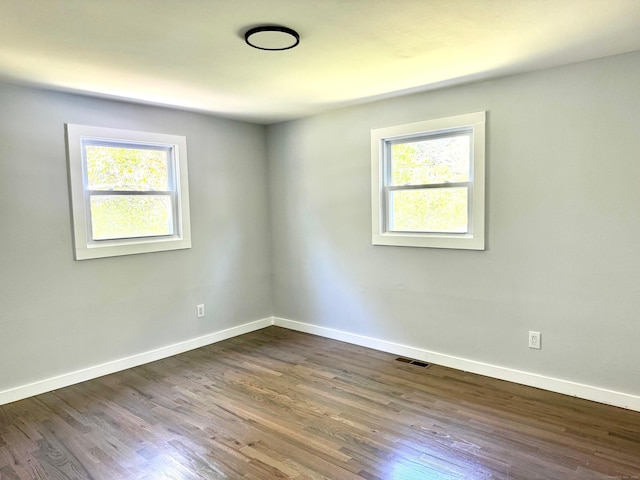 26 Nejako Dr, Middletown, CT 06457 - spare room featuring plenty of natural light and dark wood-style flooring
