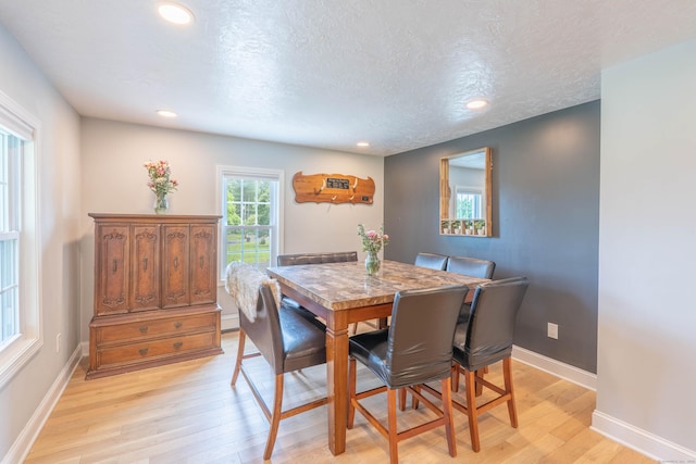 282 Montgomery Rd, Westfield, MA 01085 - dining area featuring light wood-style floors, recessed lighting, and a textured ceiling