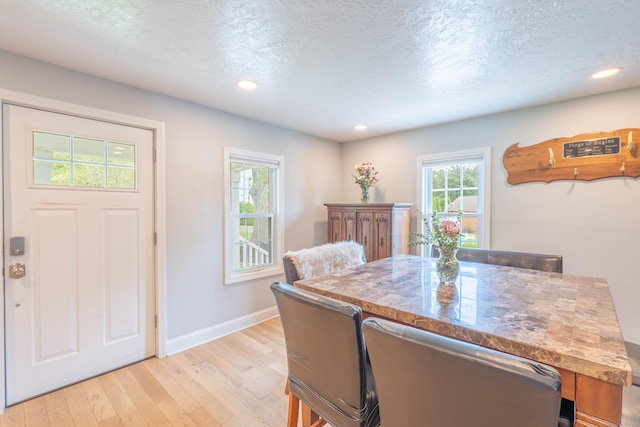 282 Montgomery Rd, Westfield, MA 01085 - dining room featuring light wood-type flooring, recessed lighting, and a textured ceiling