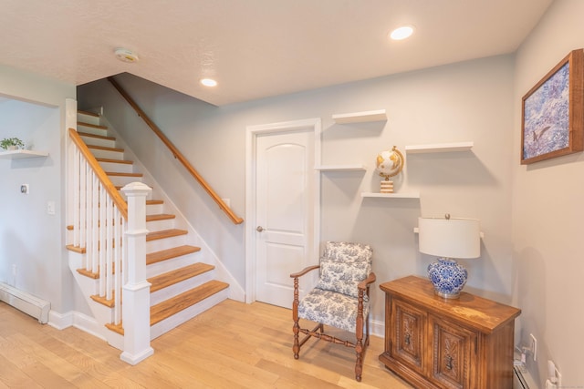 282 Montgomery Rd, Westfield, MA 01085 - stairs with a baseboard radiator, wood finished floors, and recessed lighting