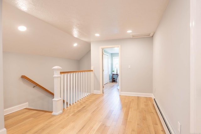 282 Montgomery Rd, Westfield, MA 01085 - hall with an upstairs landing, baseboard heating, light wood-type flooring, recessed lighting, and vaulted ceiling