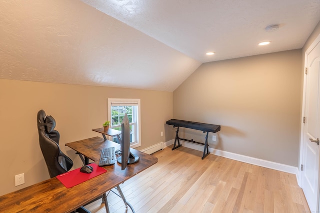 282 Montgomery Rd, Westfield, MA 01085 - office featuring vaulted ceiling, light wood finished floors, recessed lighting, and a baseboard radiator