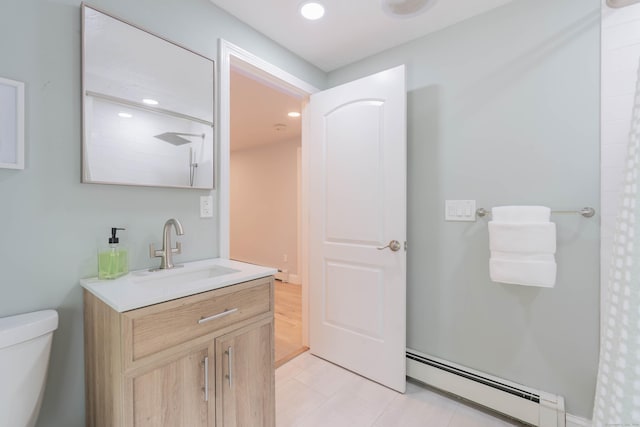 282 Montgomery Rd, Westfield, MA 01085 - bathroom featuring a baseboard radiator, vanity, curtained shower, tile patterned floors, and recessed lighting