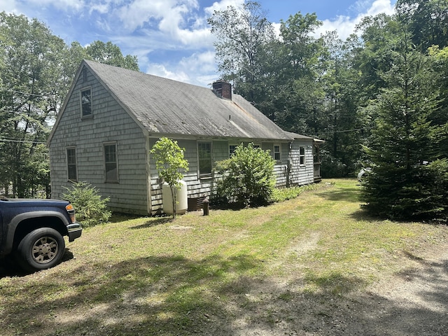 5 Obtuse Rocks Rd, Brookfield, CT 06804 - view of side of property with a chimney, a yard, and a shingled roof