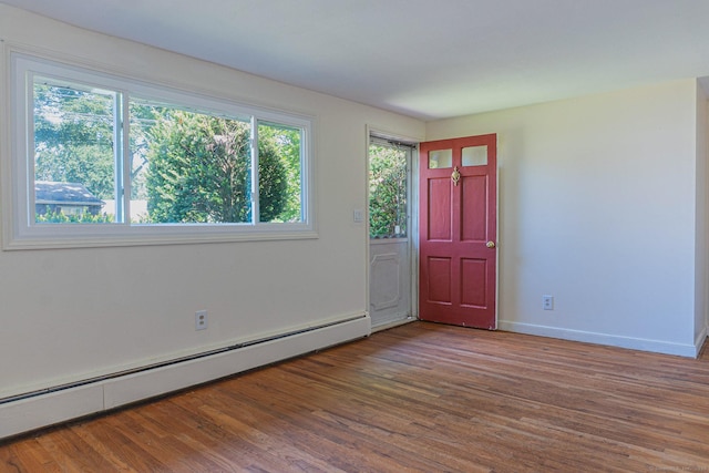 156 Overhill Dr, Berlin, CT 06037 - foyer featuring a baseboard heating unit and wood finished floors