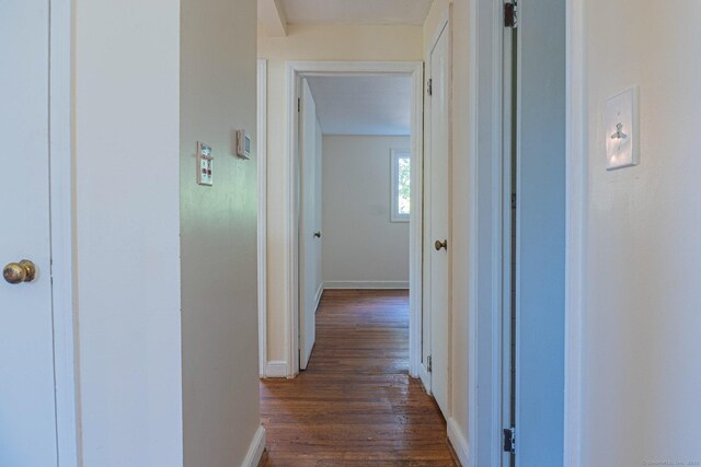 156 Overhill Dr, Berlin, CT 06037 - hall featuring dark wood-style flooring and baseboards