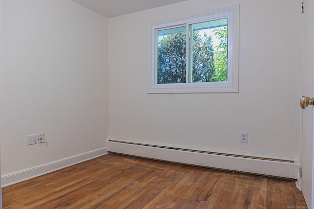 156 Overhill Dr, Berlin, CT 06037 - unfurnished room featuring a baseboard radiator and wood finished floors